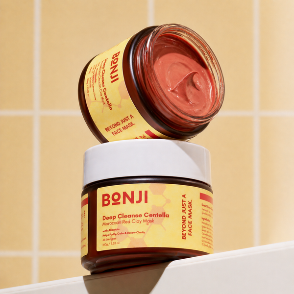 Two jars of Bonji Deep Cleanse Centella Moroccan Red Clay Mask on a beige tiled background