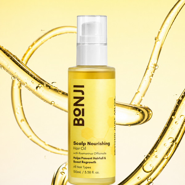 BONJI Scalp Nourishing Hair Oil bottle on a yellow background with oil droplets.