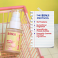 Bonji Milk Thistle & Vitamin B-12 Face Serum in a pink shopping cart with a list of product features on a yellow background.