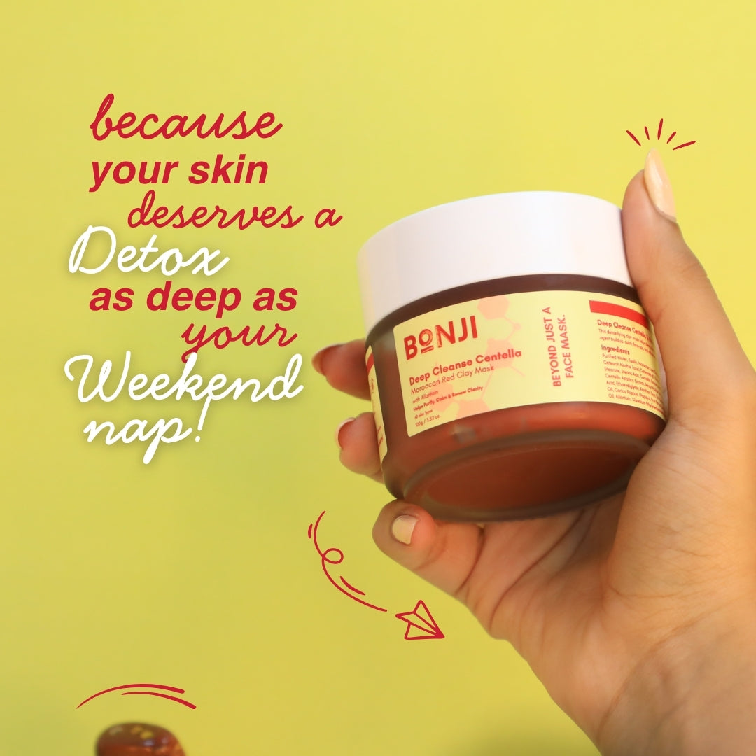 Hand holding a jar of Bonji Deep Cleansing Clay Mask with promotional text on a yellow background